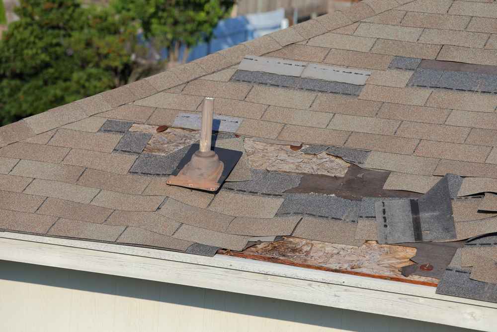 How to Deal with Roof Wind Damage in Carmel?